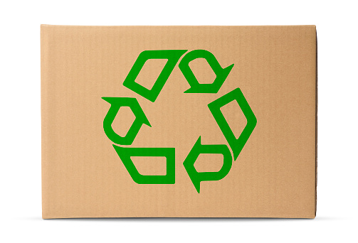 Cardboard box with green recycling symbol, isolated on white with clipping path.\nRecycling concepts.