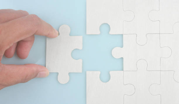 istock Connecting jigsaw puzzle . Business solutions success and strategy concept 1352584917
