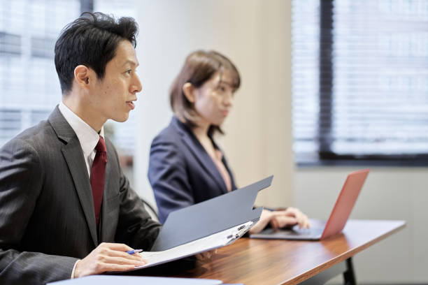 istock Asian manager business person interviewing 1352588557