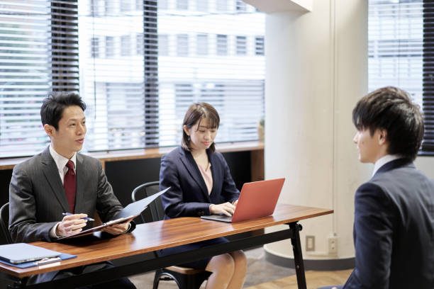 Asian manager business person interviewing