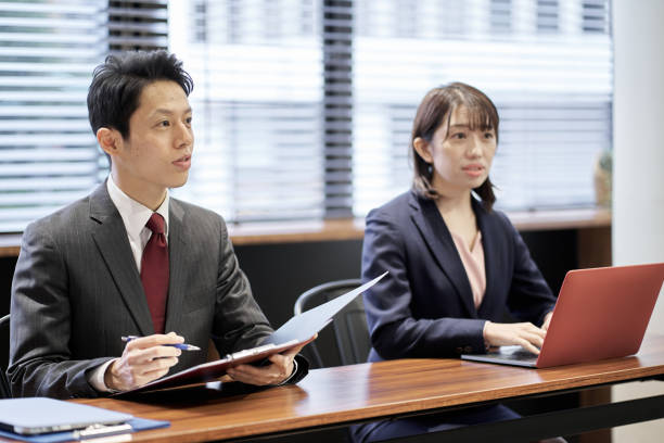 istock Asian manager business person interviewing 1352588576