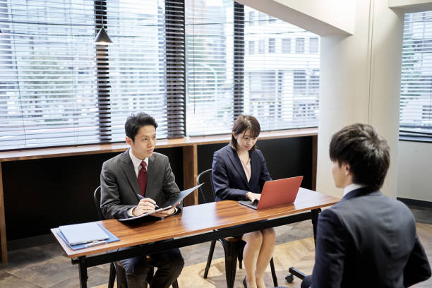 istock Asian manager business person interviewing 1352588583