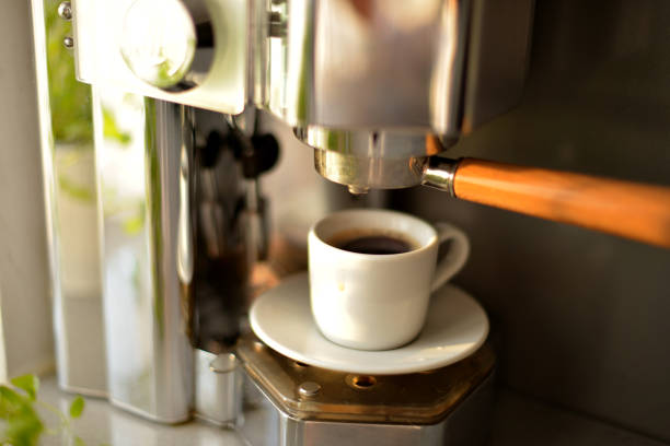 istock Fresh black aromatic coffee made in a coffee maker. Morning coffee. Coffee machine in the kitchen 1352589120