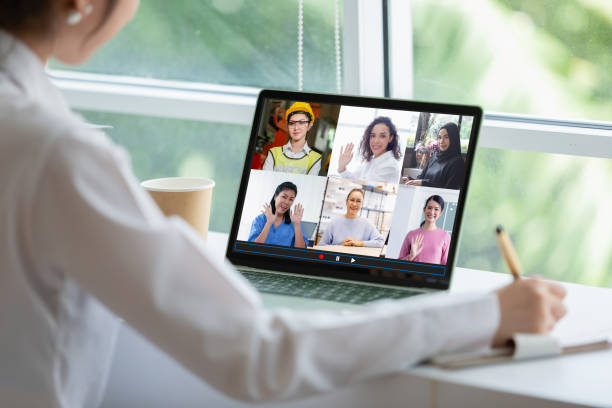 istock Conference video call communication, group talking online on laptop. 1352591861