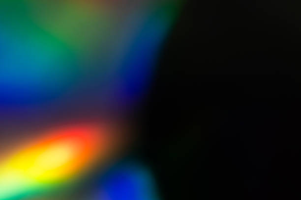 istock colorful rainbow crystal light leaks on black background 1352592592