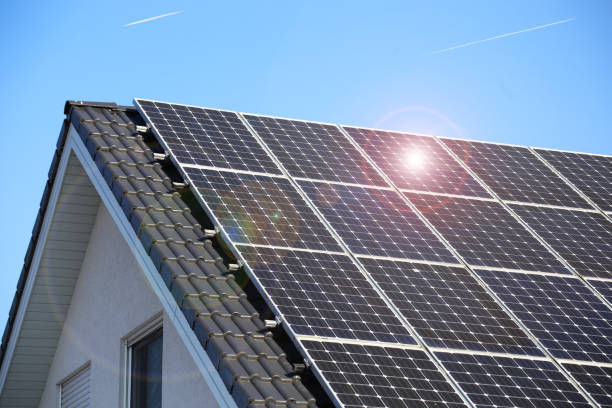 Single family house with solar system or photovoltaic system stock photo
