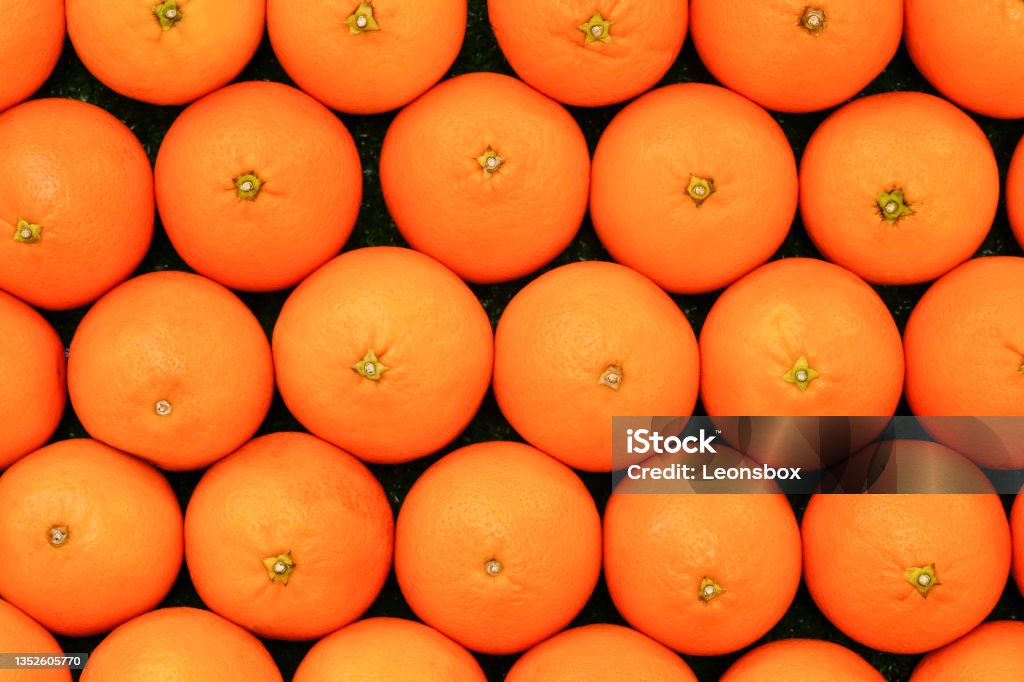 Vitamin replenishment Neatly sized tangerines at a farmers market. Backgrounds Stock Photo