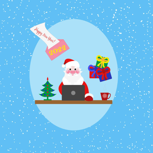 istock Santa Claus at the computer on the background of Christmas elements 1352609011