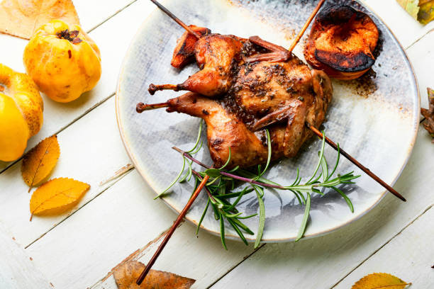 istock Quail grilled with quince 1352609098