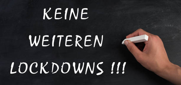 istock No more lockdowns is standing on a chalkboard, german language, pandimic covid-19 end, anti restrictions 1352609444