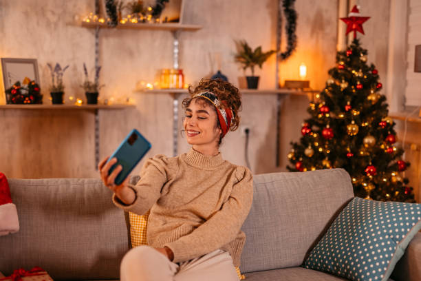 istock Young woman making selfie at New year 1352613308