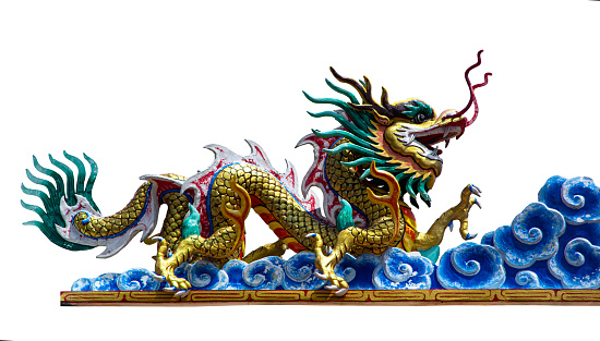 Golden dragon sculpture on displayed for the public in an iconic chinese temple