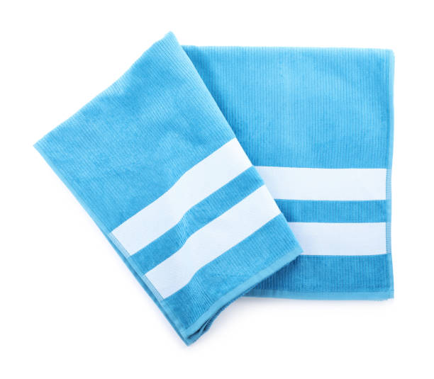 istock Blue towel isolated on white, top view. Beach object 1352616820
