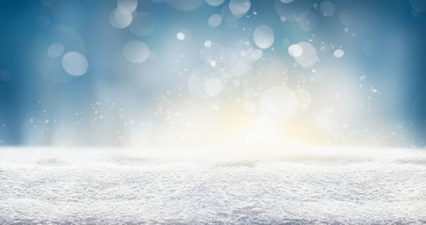 istock A cold winter snow landscape with sunny sky bokeh background 1352616888