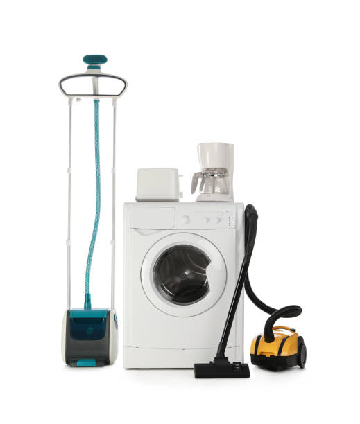 istock Set of different home appliances with vacuum cleaner on white background 1352618314