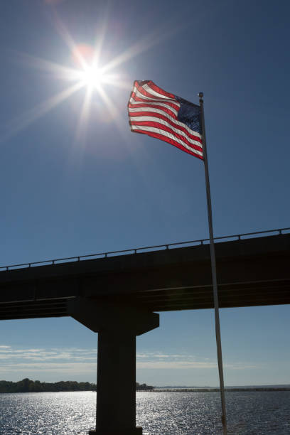 istock American flag flying in the wind 1352643039