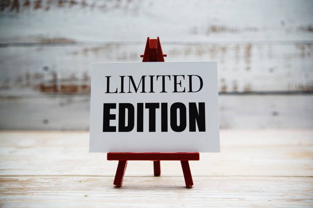 istock Limited Edition text on paper card with wooden background 1352643236