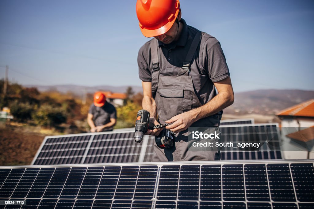 People Installing Man Installing Solar Panel Stock Photo - Download Image Now - 30-39 ...