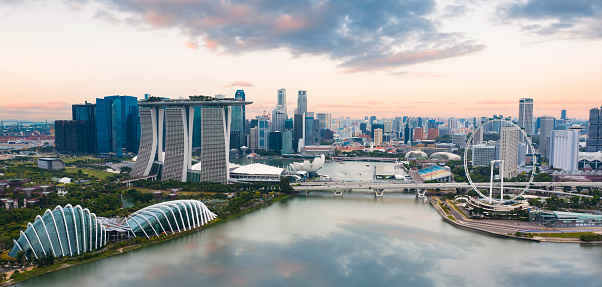 Singapore, June 14, 2019. Aerial view of the famous landmark, Marina Bay Sands in Singapore seen a sunny day. The hotel is shaped like a boat with a large infinity pool on the roof.