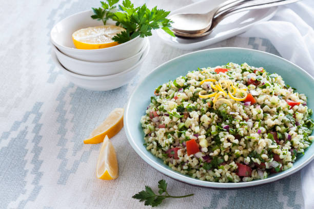 istock Tabbouleh salad. Traditional middle eastern or arab vegetarian dish 1352651775