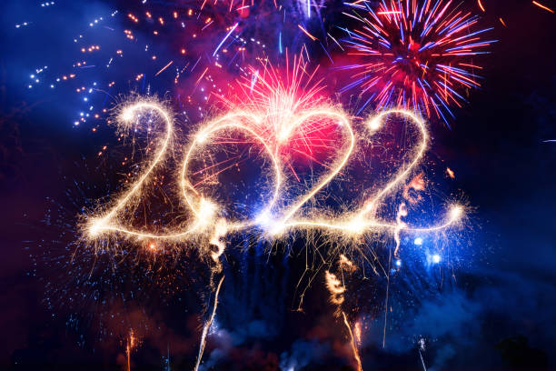 istock Sparkler Happy New Year 2022 With Fireworks 1352653131
