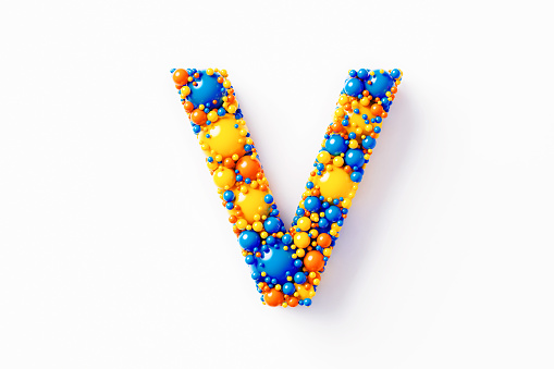 Colorful capital letter V made of many spheres sitting on white background. Horizontal composition with clipping path and copy space. Directly above.