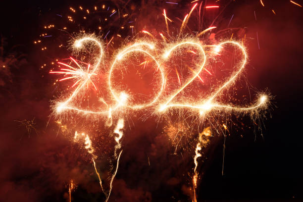 istock Sparkler Happy New Year 2022 With Fireworks 1352653591