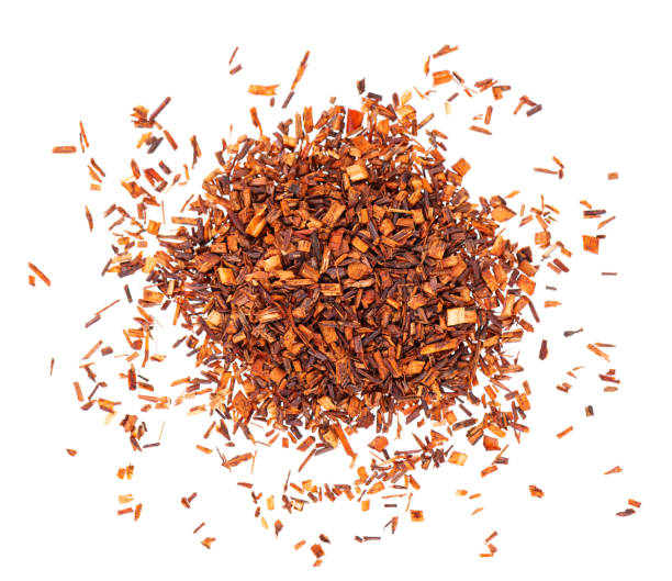 istock Rooibos red tea, isolated on white background. Traditional herbal and organic tea. Top view. 1352654582