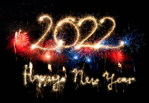 istock Sparkler Happy New Year 2022 With Fireworks 1352654885