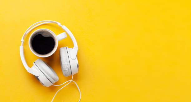 istock Headphones and coffee cup 1352656106
