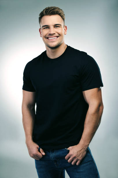 istock Studio shot of a handsome young man posing against a grey background 1352656968