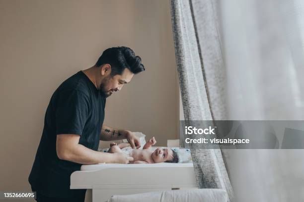 Father Changing His Babys Diaper Stock Photo - Download Image Now - Father, Changing Diaper, Baby - Human Age