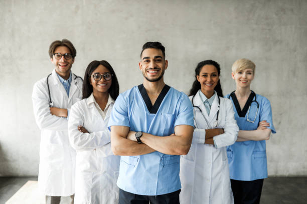 istock International team of doctors posing together while having morning breefing 1352662584