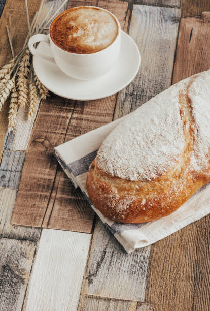 istock fresh bread on wooden background 1352663218