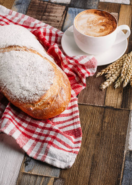 istock fresh bread on wooden background 1352663220