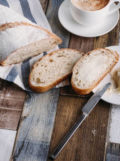 istock fresh bread on wooden background 1352663225