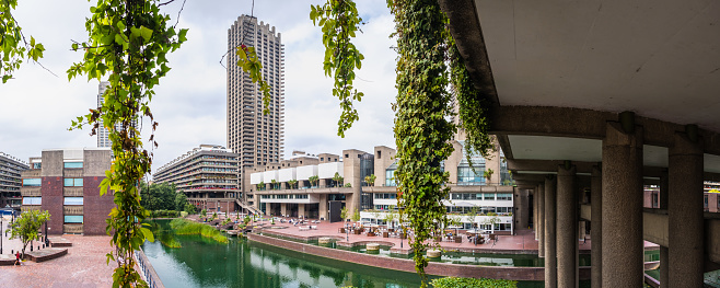 The iconic brutalist architecture of The Barbican housing estate in the City of London, UK.