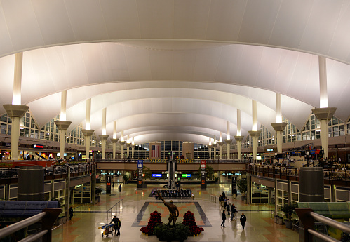 Denver, Colorado, USA: central hall of the main terminal, the Jeppesen Terminal, named after aviation safety pioneer Elrey Borge Jeppesen - tensile membrane structure designed by Fentress Bradburn Architects -  Denver International Airport.