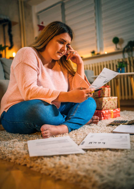 istock Worried woman manage finances 1352667570