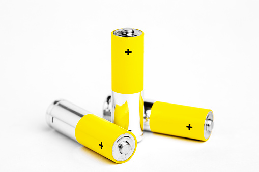 AA alkaline batteries on white background