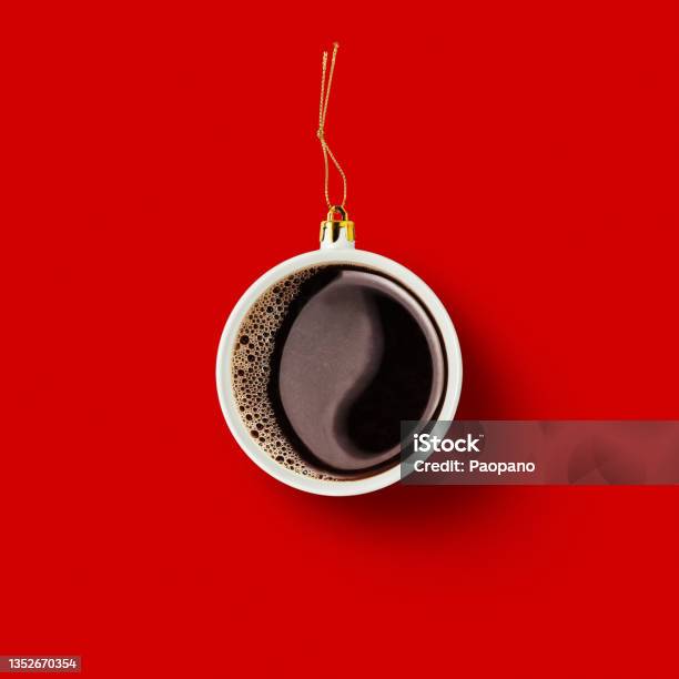 https://media.istockphoto.com/id/1352670354/photo/christmas-bauble-decoration-made-of-cup-of-coffee-on-red-background-minimal-concept-for.jpg?s=612x612&w=is&k=20&c=_vkG5dHQgEydoH3n8Dx3PERmveyP-P-VLOnQmRnbnZc=
