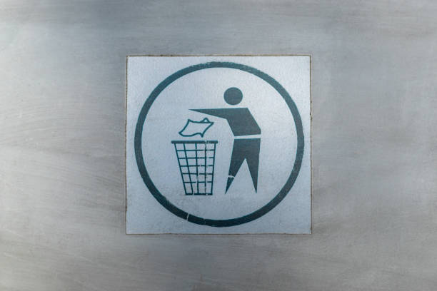 istock Garbage symbol, recycle bin icon, logo on metal background. 1352670365