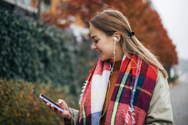 istock Woman listen music 1352672422