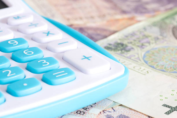 istock A calculator and banknotes Polish Zloty PLN 1352676839