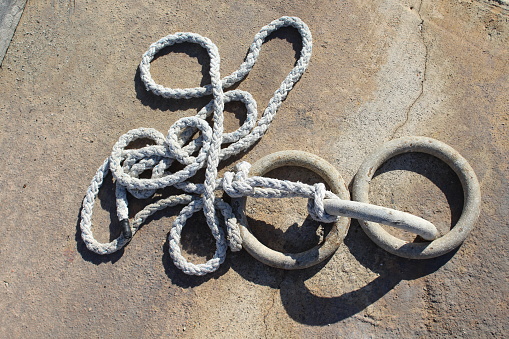 Mooring ropes on the deck of a ferry on Lake Como at Como, Italy.