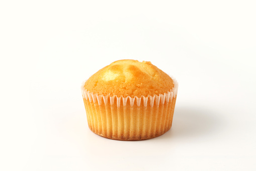 plain cupcake muffin isolated on white background