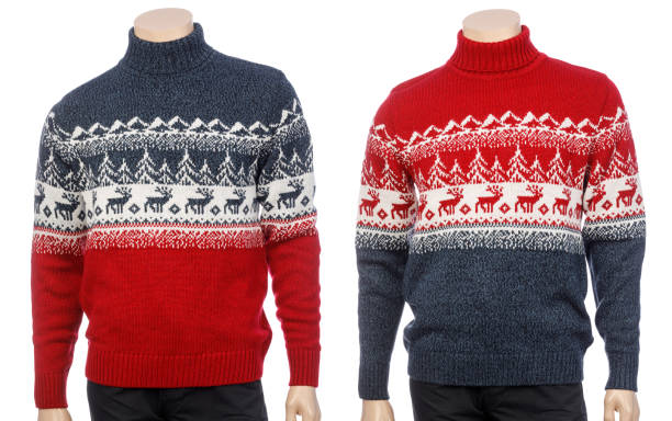 istock Blue and red knitted Christmas turtleneck sweaters on a mannequin isolated 1352682450