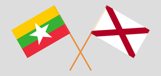 Crossed flags of Myanmar and The State of Alabama. Official colors. Correct proportion Crossed flags of Myanmar and The State of Alabama. Official colors. Correct proportion. Vector illustration alabama football stock illustrations