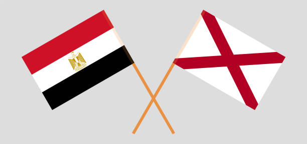 Crossed flags of Egypt and The State of Alabama. Official colors. Correct proportion Crossed flags of Egypt and The State of Alabama. Official colors. Correct proportion. Vector illustration alabama football stock illustrations