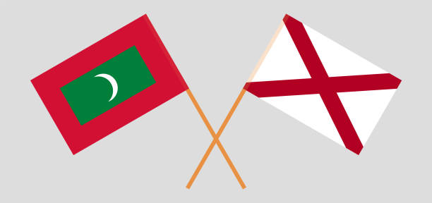 Crossed flags of Maldives and The State of Alabama. Official colors. Correct proportion Crossed flags of Maldives and The State of Alabama. Official colors. Correct proportion. Vector illustration alabama football stock illustrations